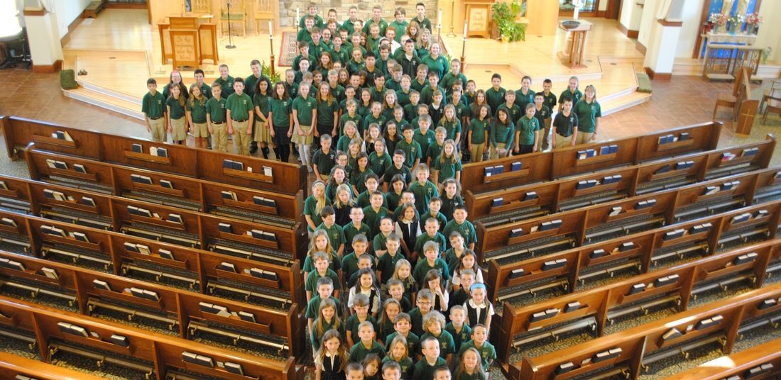 Private K-8 Catholic Students Forming Cross at Catholic K-8 St. Helen School