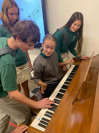 St Helens Elementary & St Helens Middle School Students Learning Piano