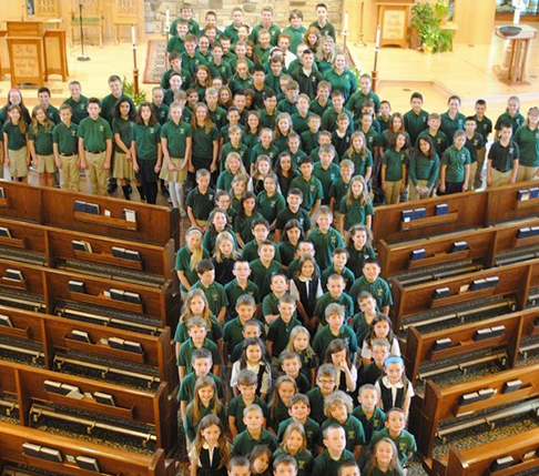 Kids Forming Cross of Faith at St. Helen School